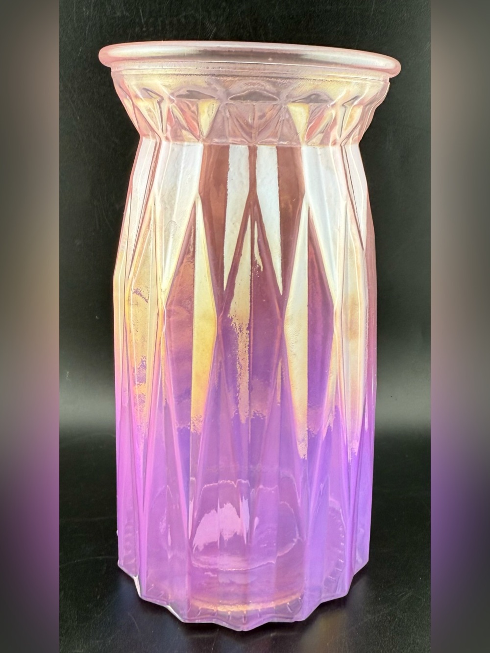 Ombre glass flower vase featuring a pink-to-purple. W/geometric faceted design.
